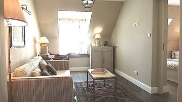 Classic Suite, 2 Bedrooms, 2 Bathrooms, City View | Living room | Flat-screen TV