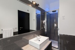 Shower, free toiletries, hair dryer, bathrobes