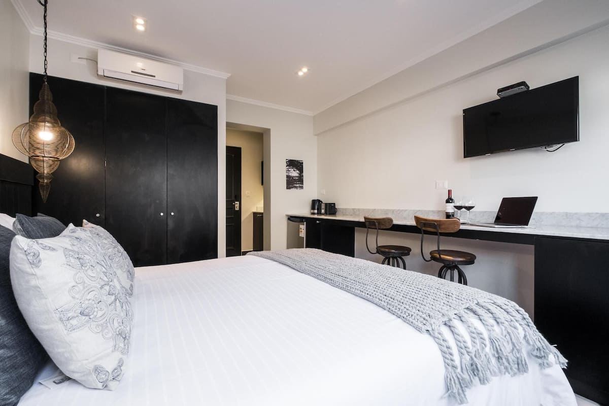 Down comforters, pillowtop beds, in-room safe, desk