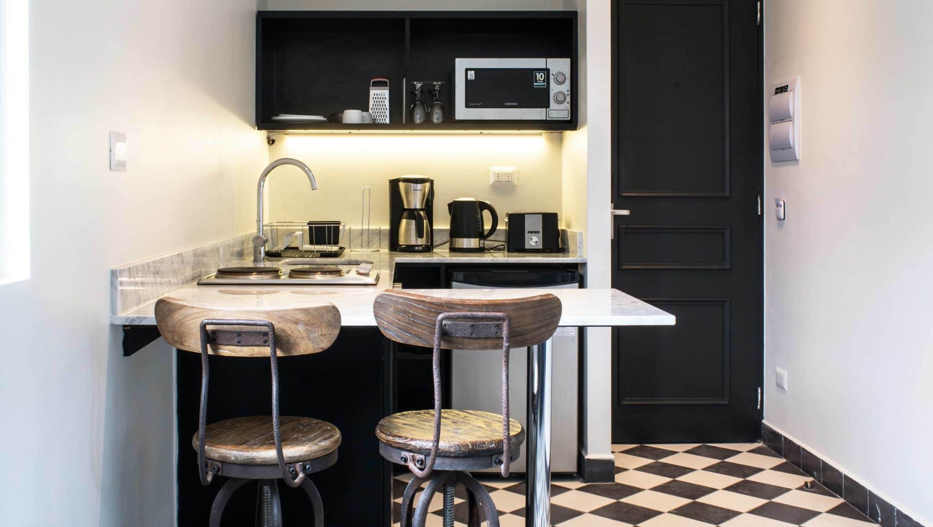 Fridge, microwave, stovetop, cookware/dishes/utensils