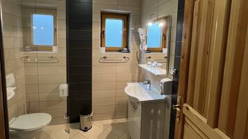 Shower, free toiletries, hair dryer, towels