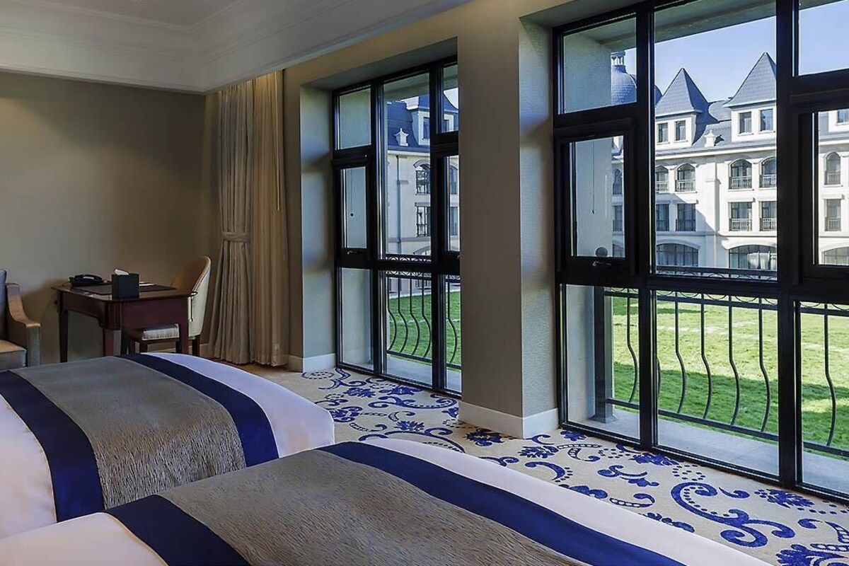 Habitación Deluxe, 2 camas individuales | Ropa de cama de alta calidad y minibar
