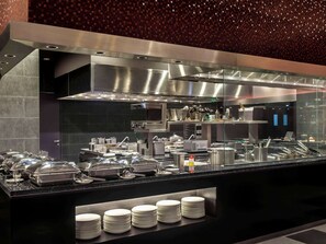 Breakfast, lunch served; international cuisine, al fresco dining
