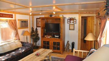 Cabin, 2 Bedrooms (Kodiac) | Living area | Flat-screen TV