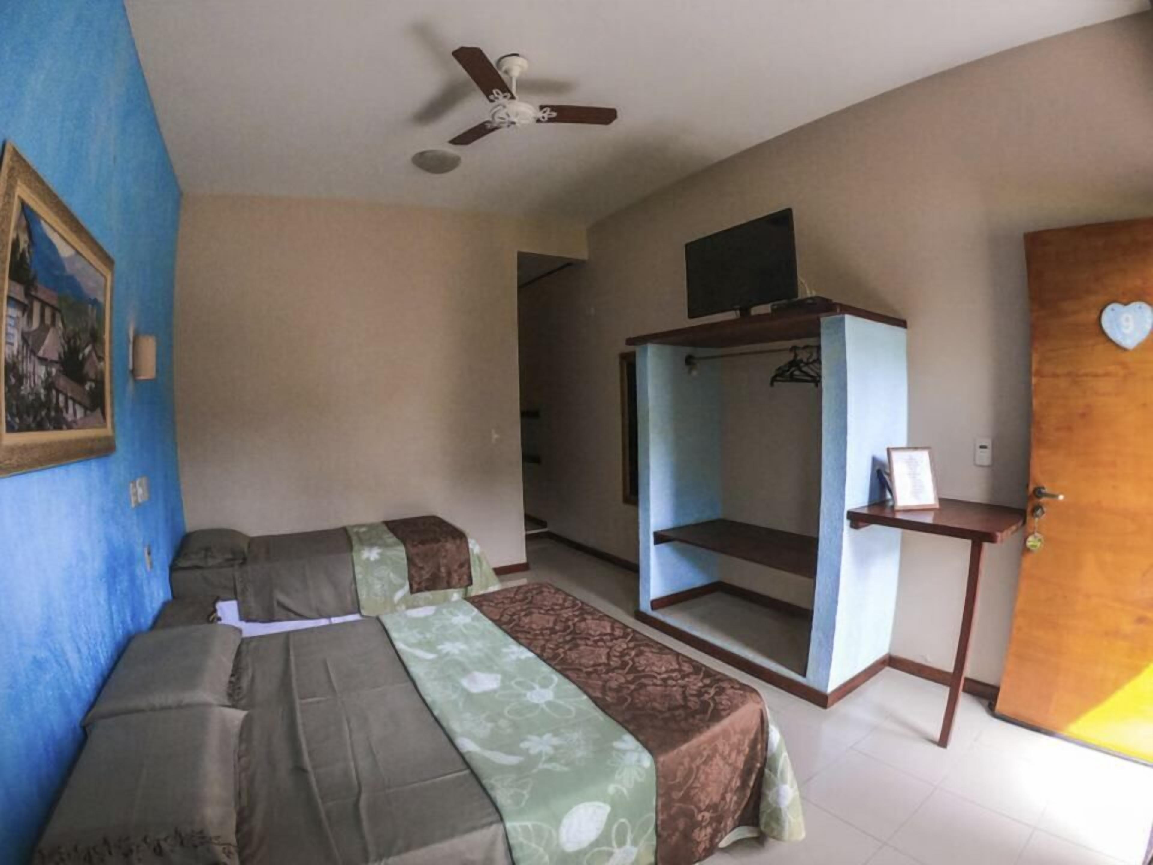 Standard Triple Room | Minibar, blackout drapes, free WiFi, bed sheets