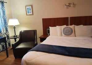 Tabla de planchar con plancha, wifi gratis y ropa de cama 