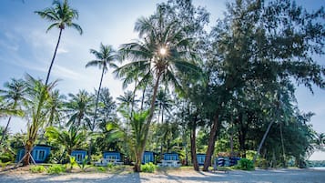 On the beach, sun-loungers, beach umbrellas, beach towels