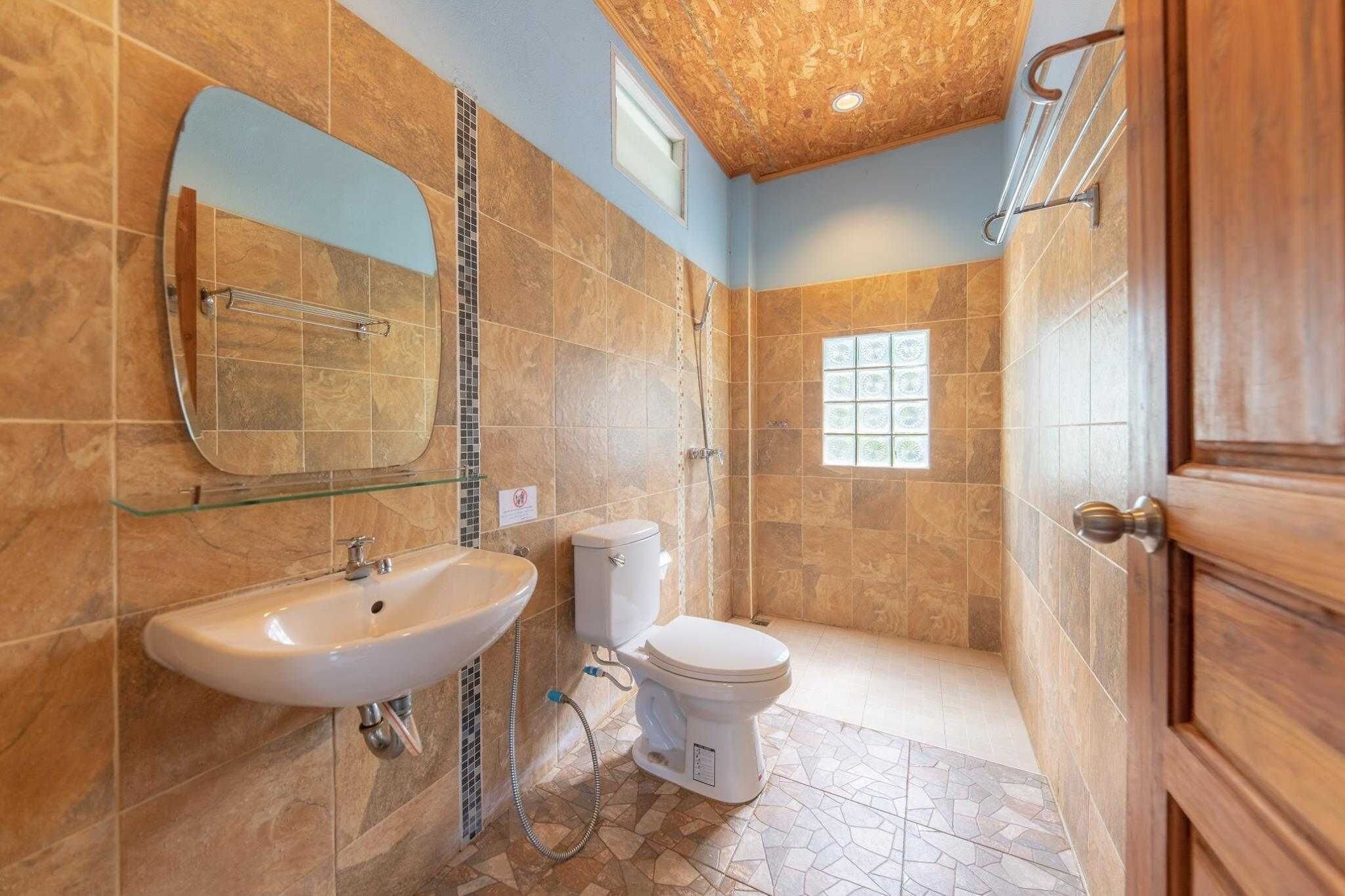 coconut garden deluxe | bathroom | shower, free toiletries, hair dryer, towels