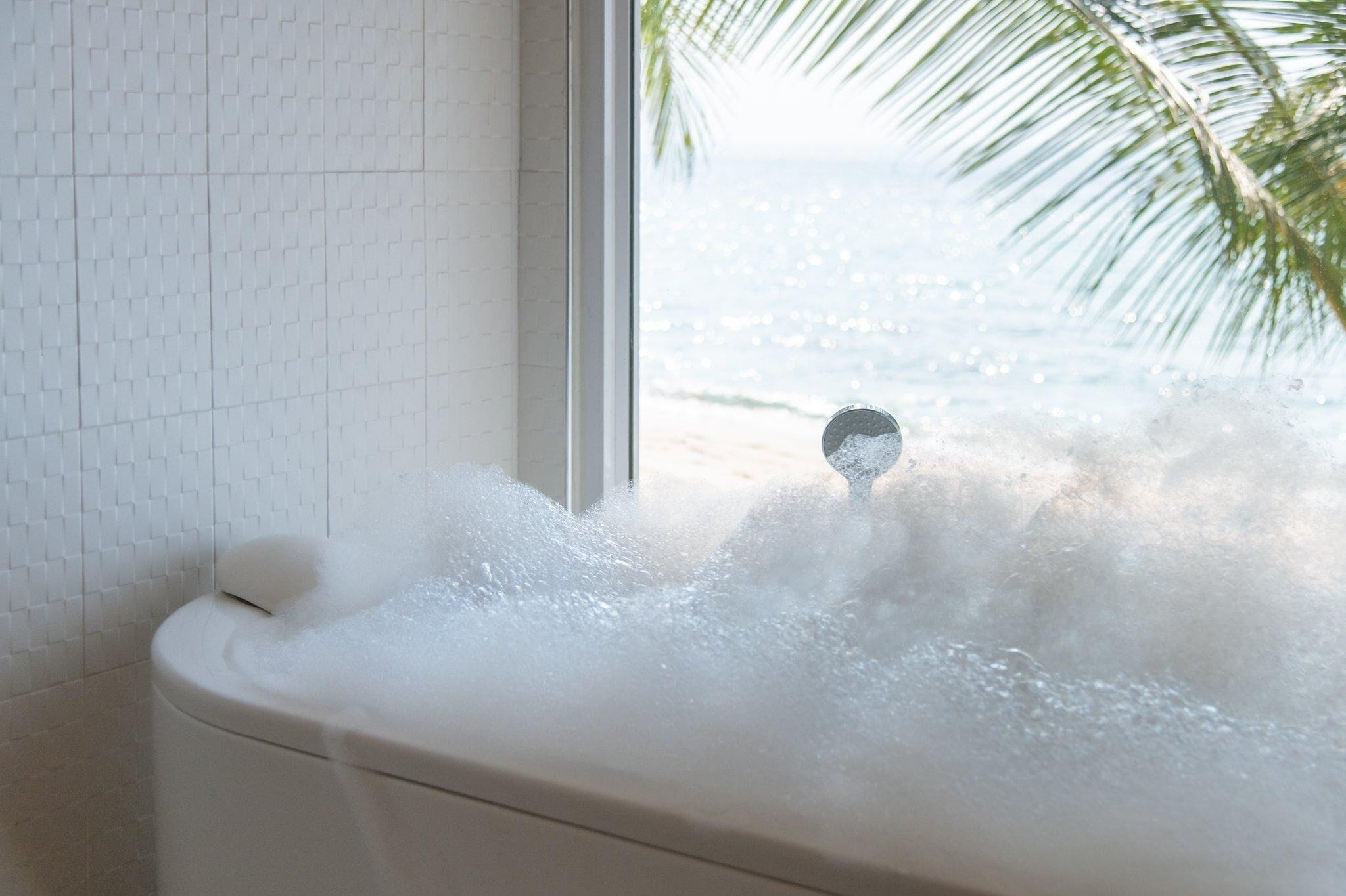 beach front deluxe with jacuzzi bathroom | bathroom | shower, free toiletries, hair dryer, towels