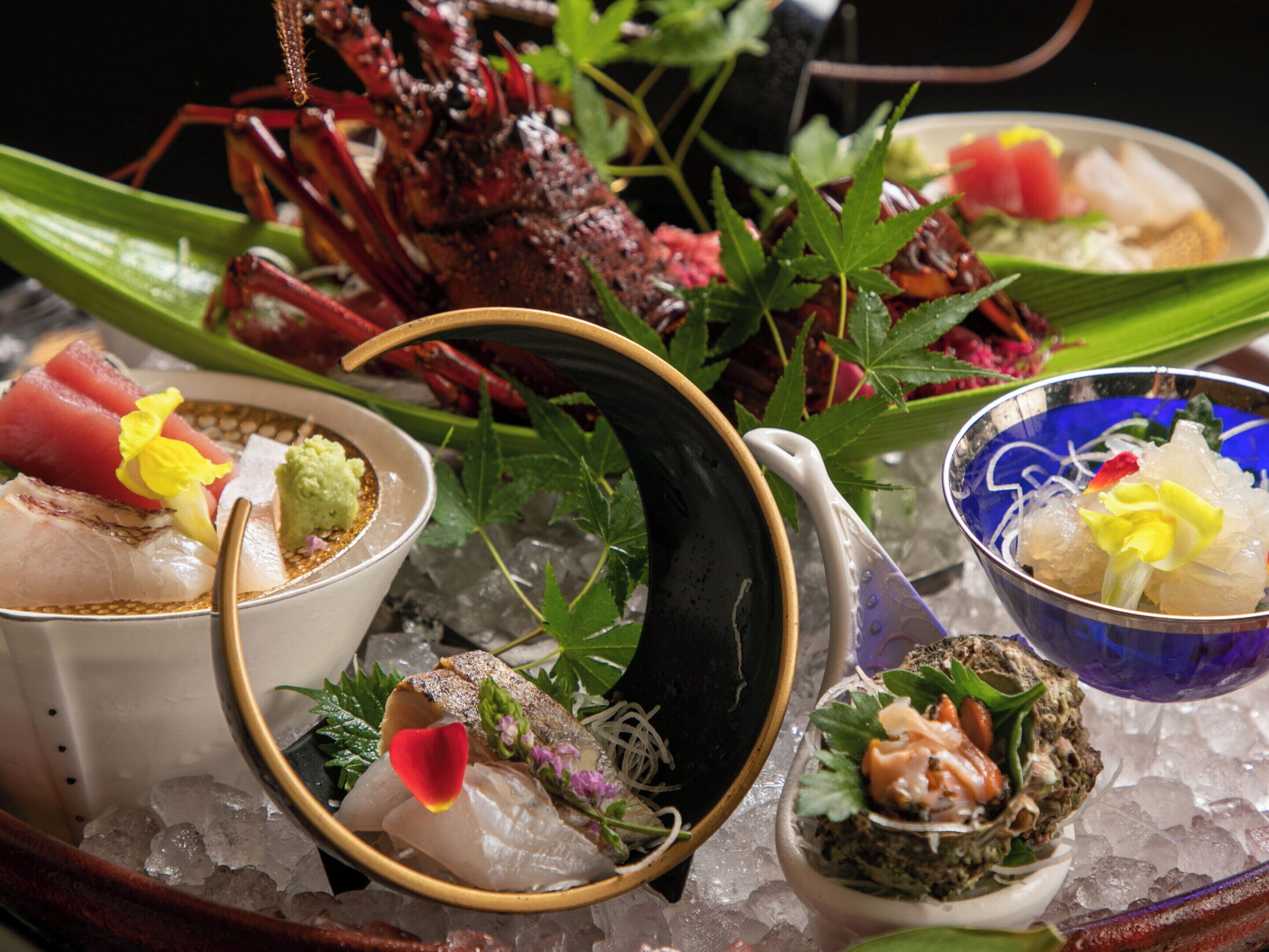A variety of seafood dishes served on ice, including sashimi and seafood bowls.