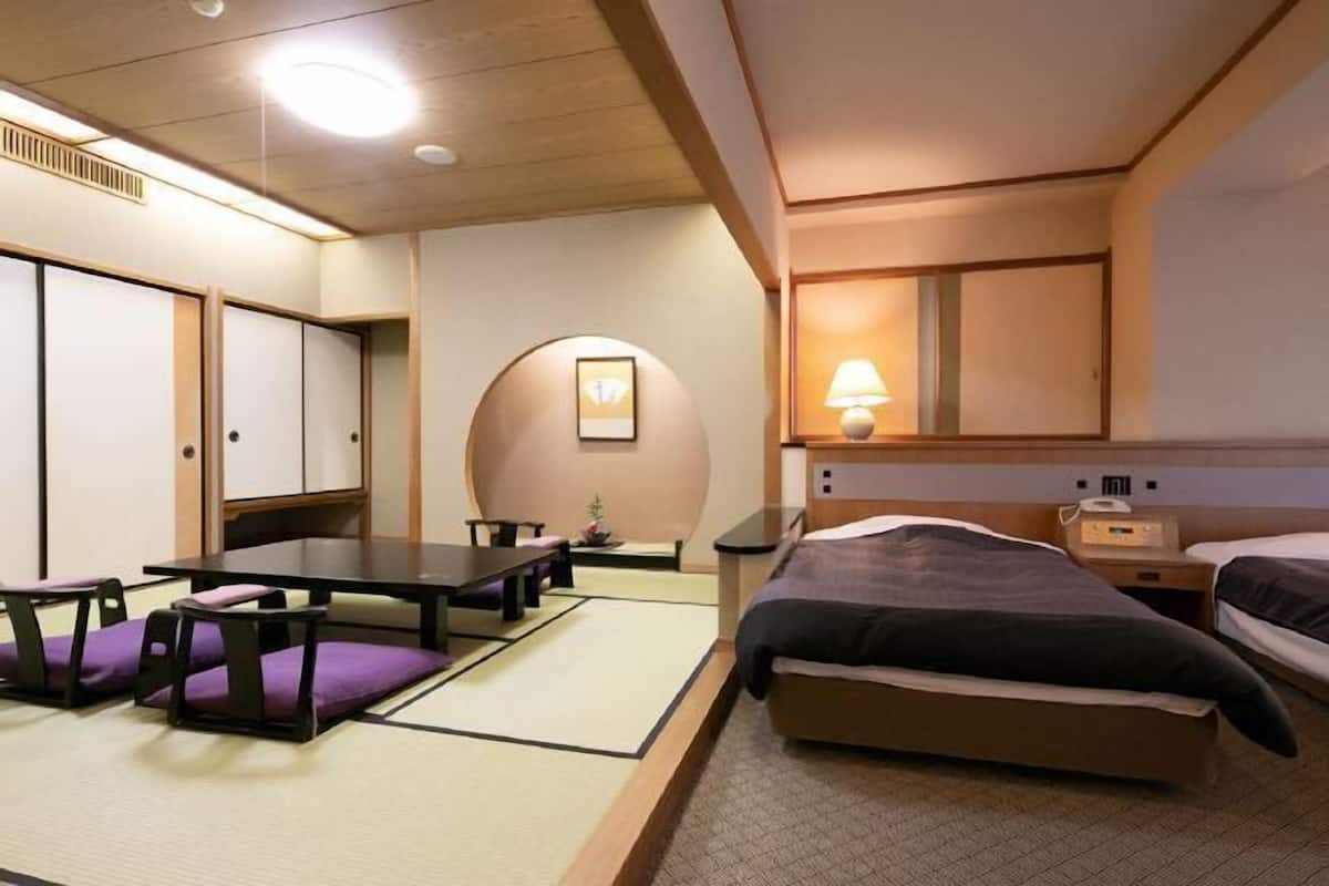 Luxe beddengoed, een kluis op de kamer, een bureau, gratis wifi