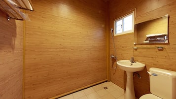 Family Room (six people) | Bathroom | Shower, rainfall showerhead, free toiletries, hair dryer