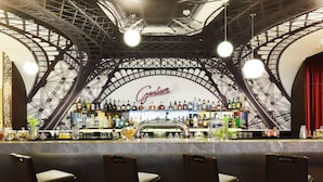 A bar with a distinctive arched ceiling and a large 'Gustave' sign. - Pullman Yangon Centrepoint (Yangon)