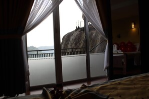Deluxe Room, 1 Bedroom, Mountain View | Premium bedding, minibar, laptop workspace, iron/ironing board