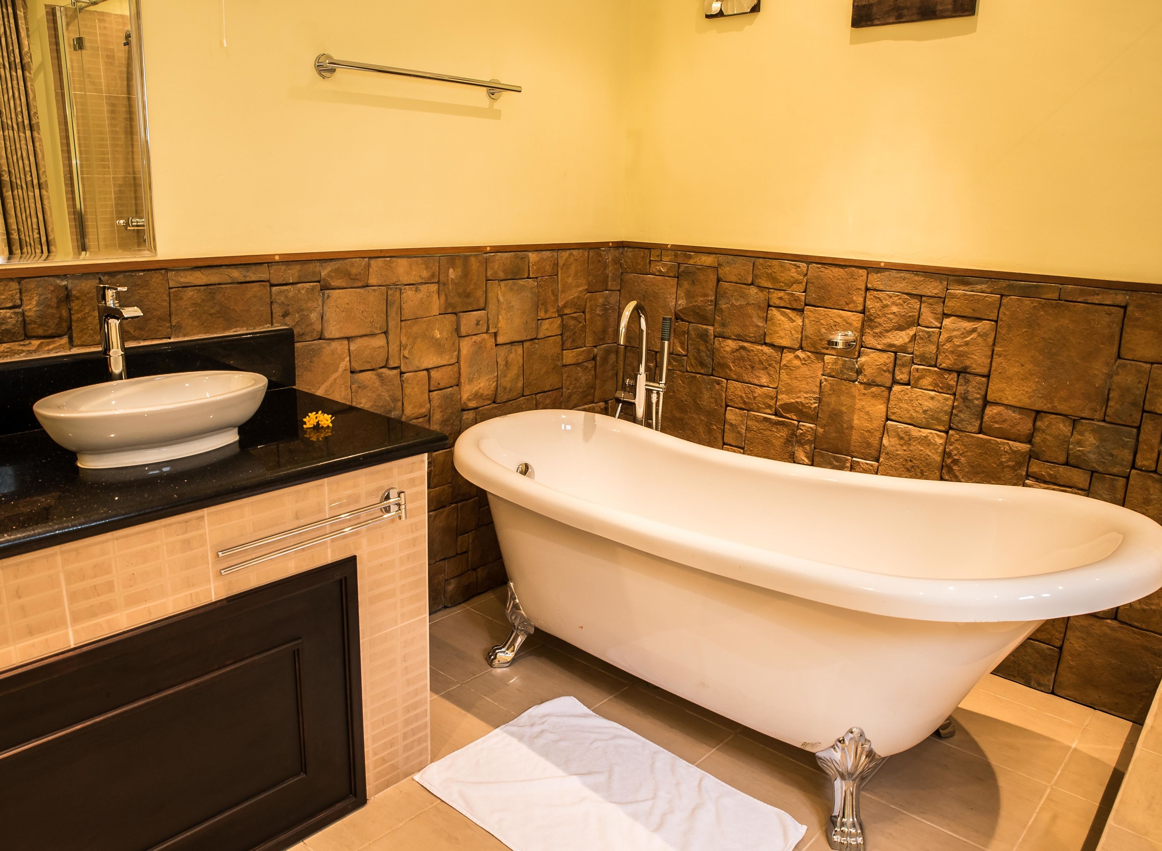 superior double or twin room, pool view, poolside | deep-soaking bathtub