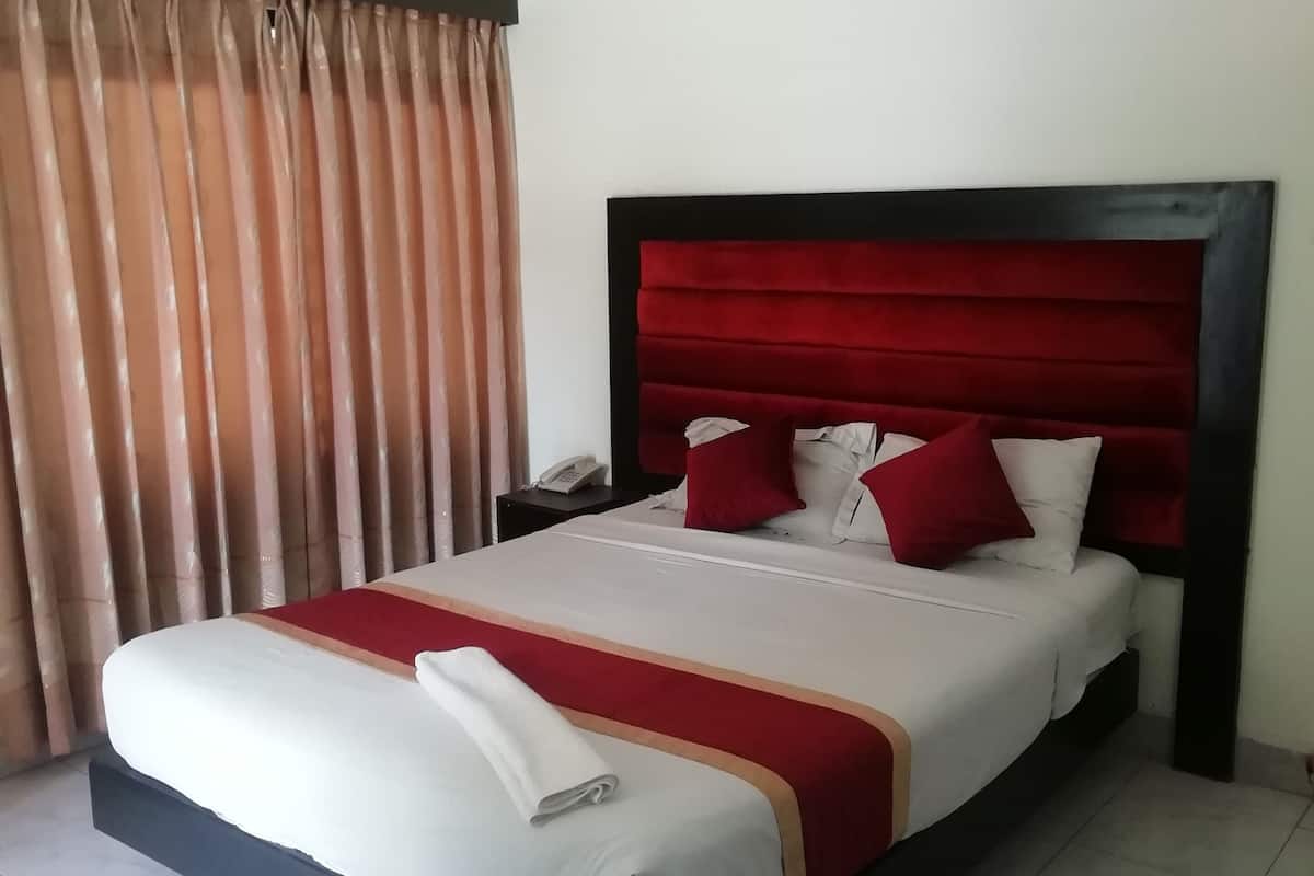 Deluxe Single Room | Gebar bulu kapas, tilam berlapik, peti besi dalam bilik
