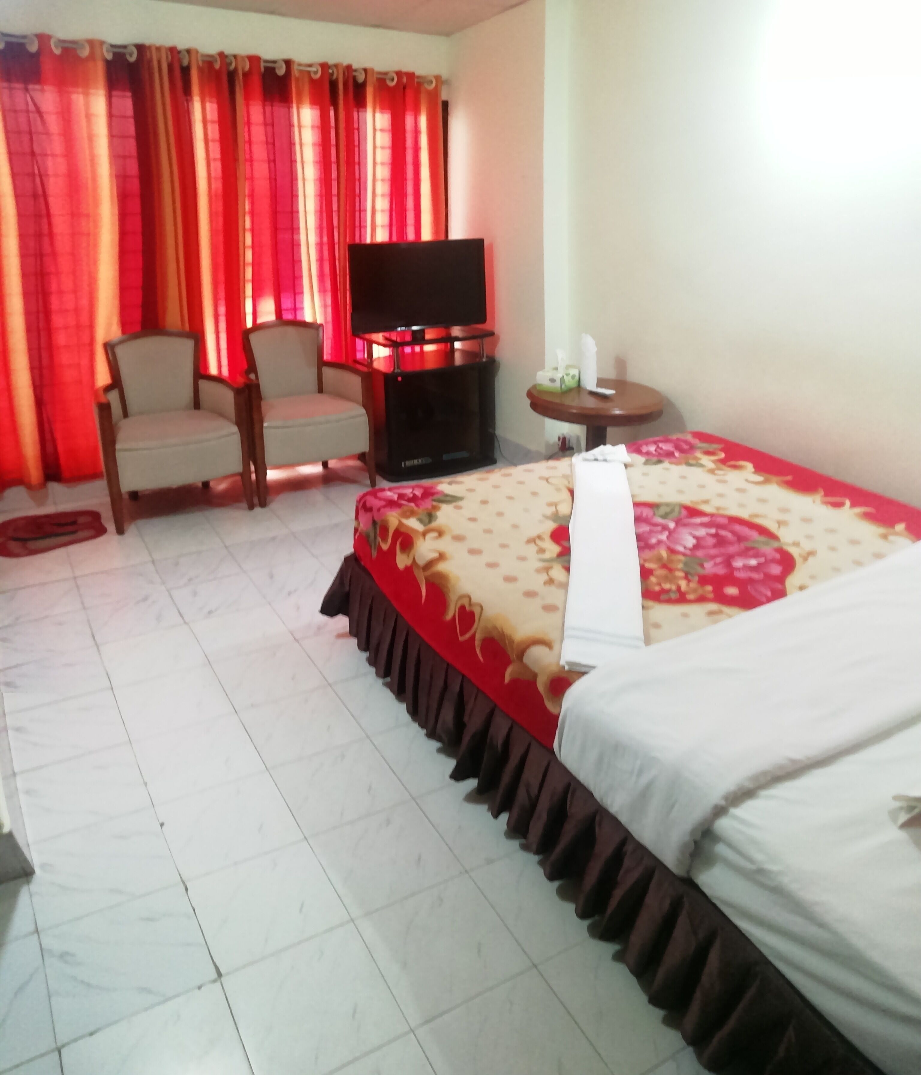Down duvets, pillow-top beds, in-room safe, desk