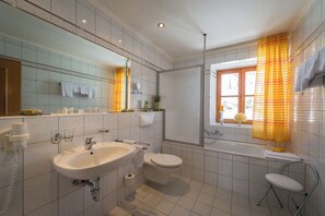 Apartment, Balcony | Bathroom | Combined shower/tub, free toiletries, hair dryer, bathrobes