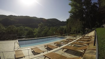 Outdoor pool, sun loungers