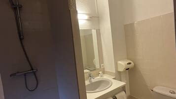 Shower, free toiletries, towels, soap