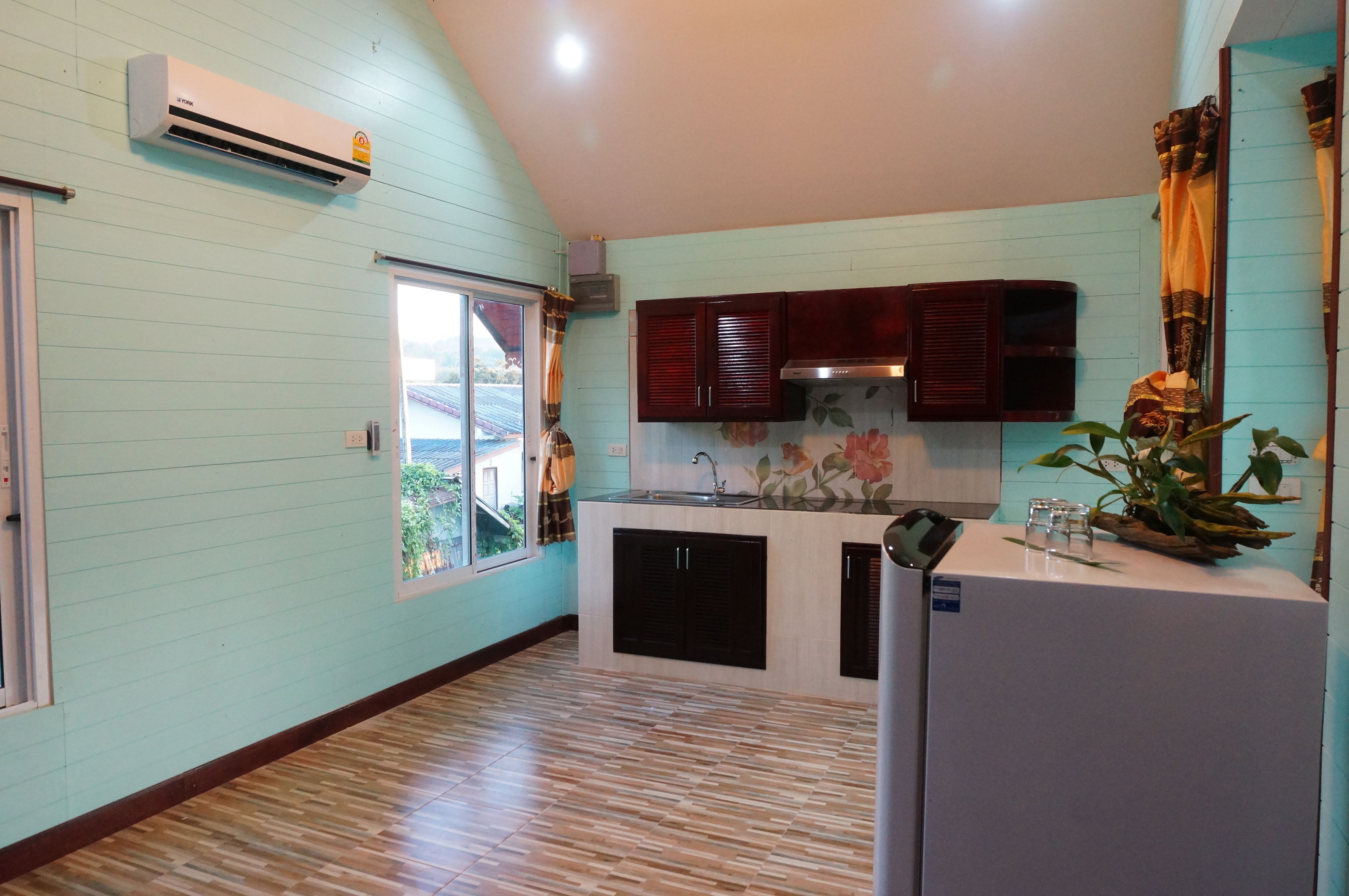 family room | private kitchen | full-sized fridge