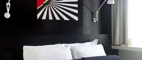 Ropa de cama de alta calidad y minibar