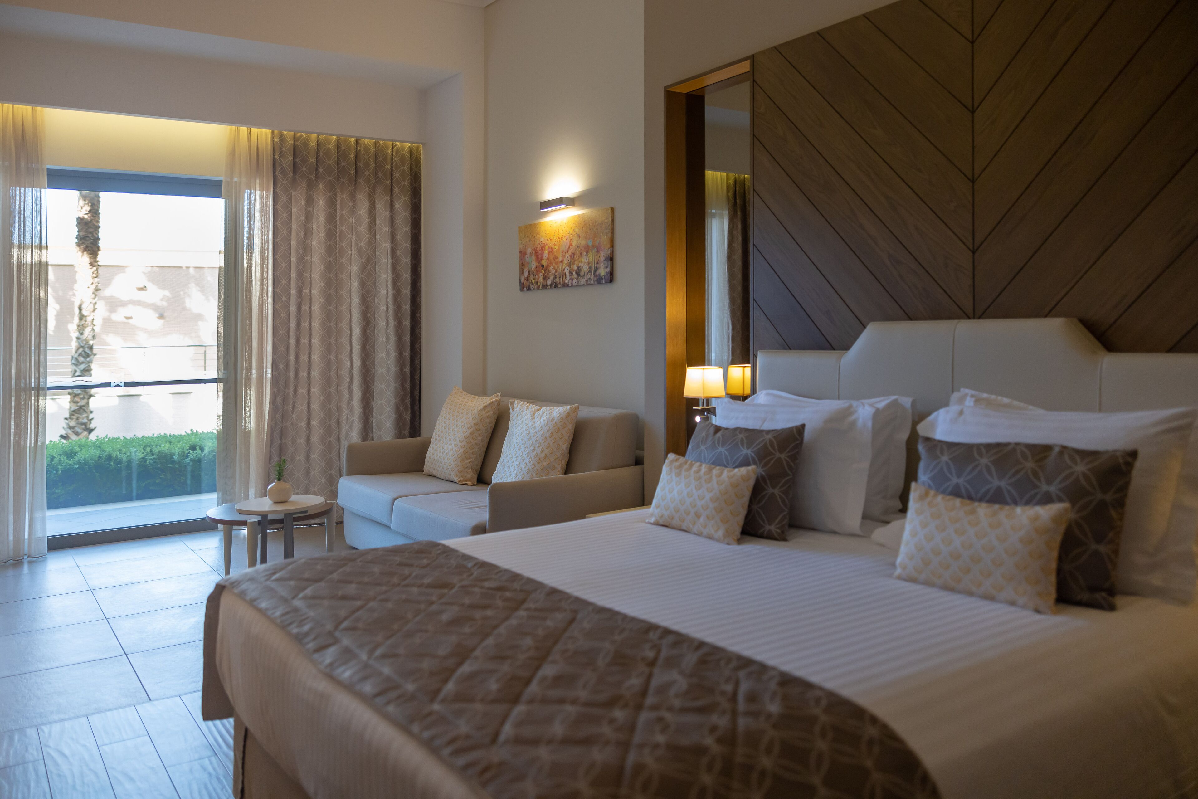 Deluxe Garden View Room | Premium bedding, minibar, in-room safe, desk