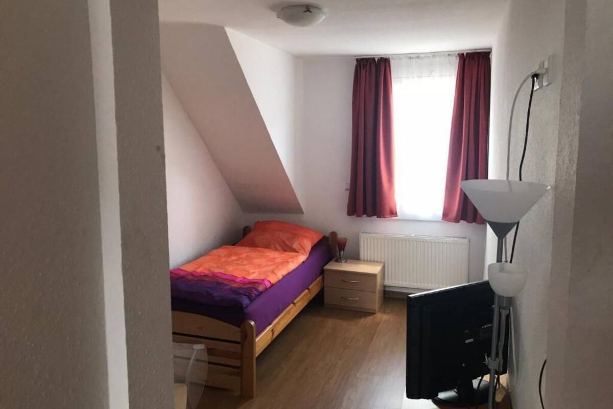 twin room | in-room safe, individually decorated, bed sheets