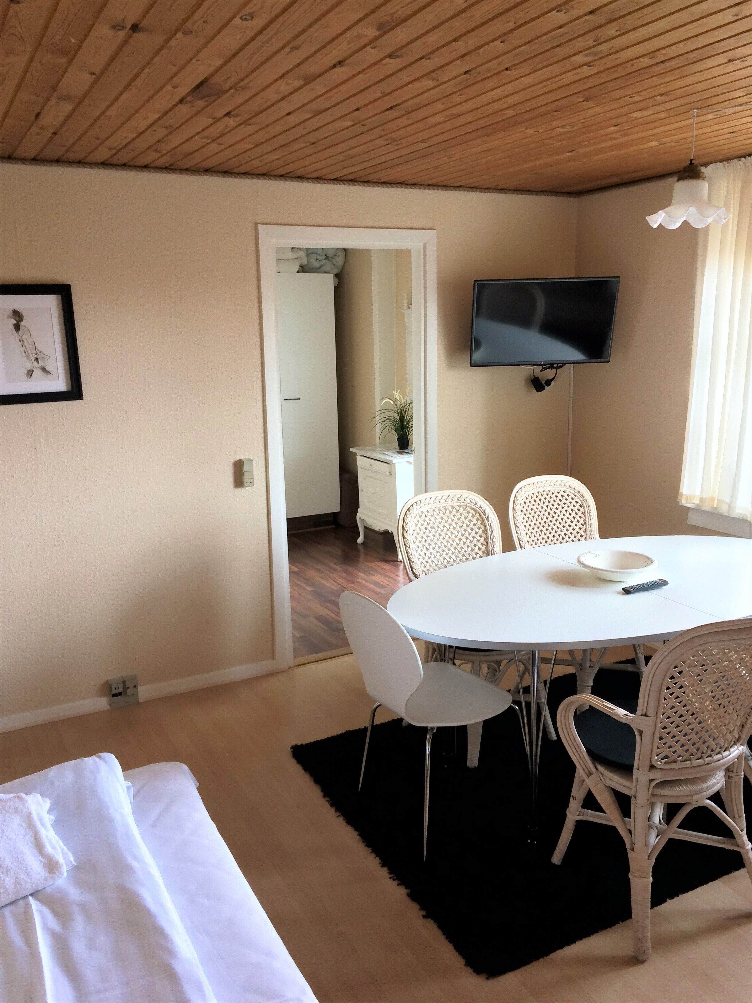 apartment, 1 bedroom, patio (gæstgiverstien) | living area | flat-screen tv