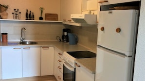Apartment, 1 Bedroom, Patio (Gæstgiverstien) | Private kitchen | Fridge, oven, cookware/dishes/utensils