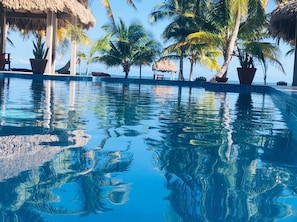 Outdoor pool, pool loungers - White Sands Cove (San Pedro)