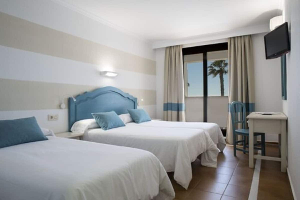 Desk, laptop workspace, WiFi (free), bed sheets