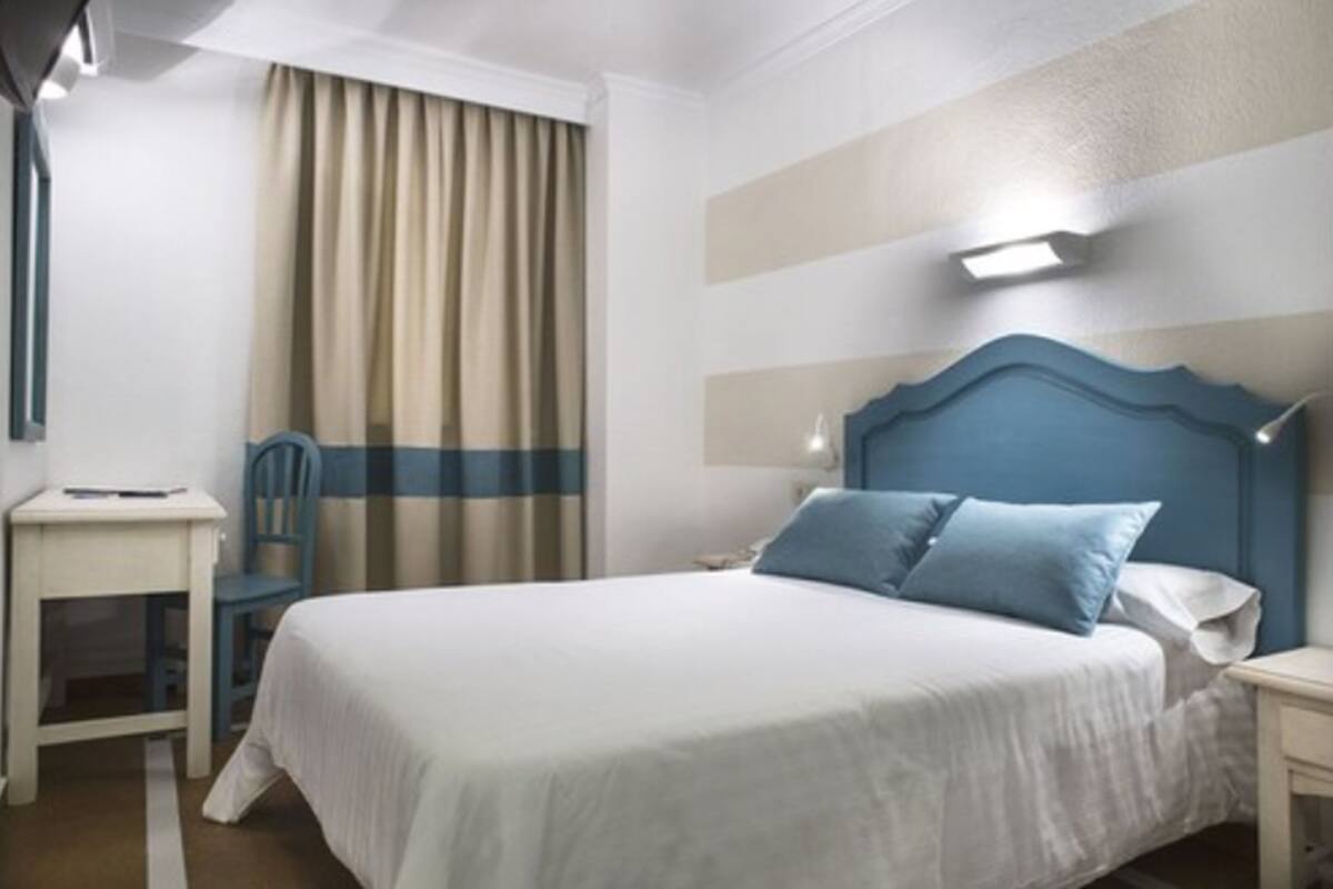 economy double room, courtyard view | desk, laptop workspace, free wifi, bed sheets