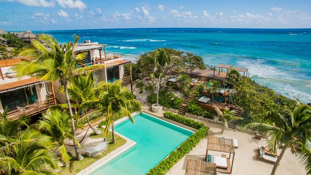 A resort with a pool, palm trees, and ocean views. - Maria Del Mar Tulum (Tulum)