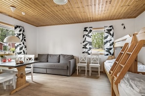 Cabin (Skidbyn) | Living room | Flat-screen TV, table tennis - First Camp Lugnet Falun (Falun)