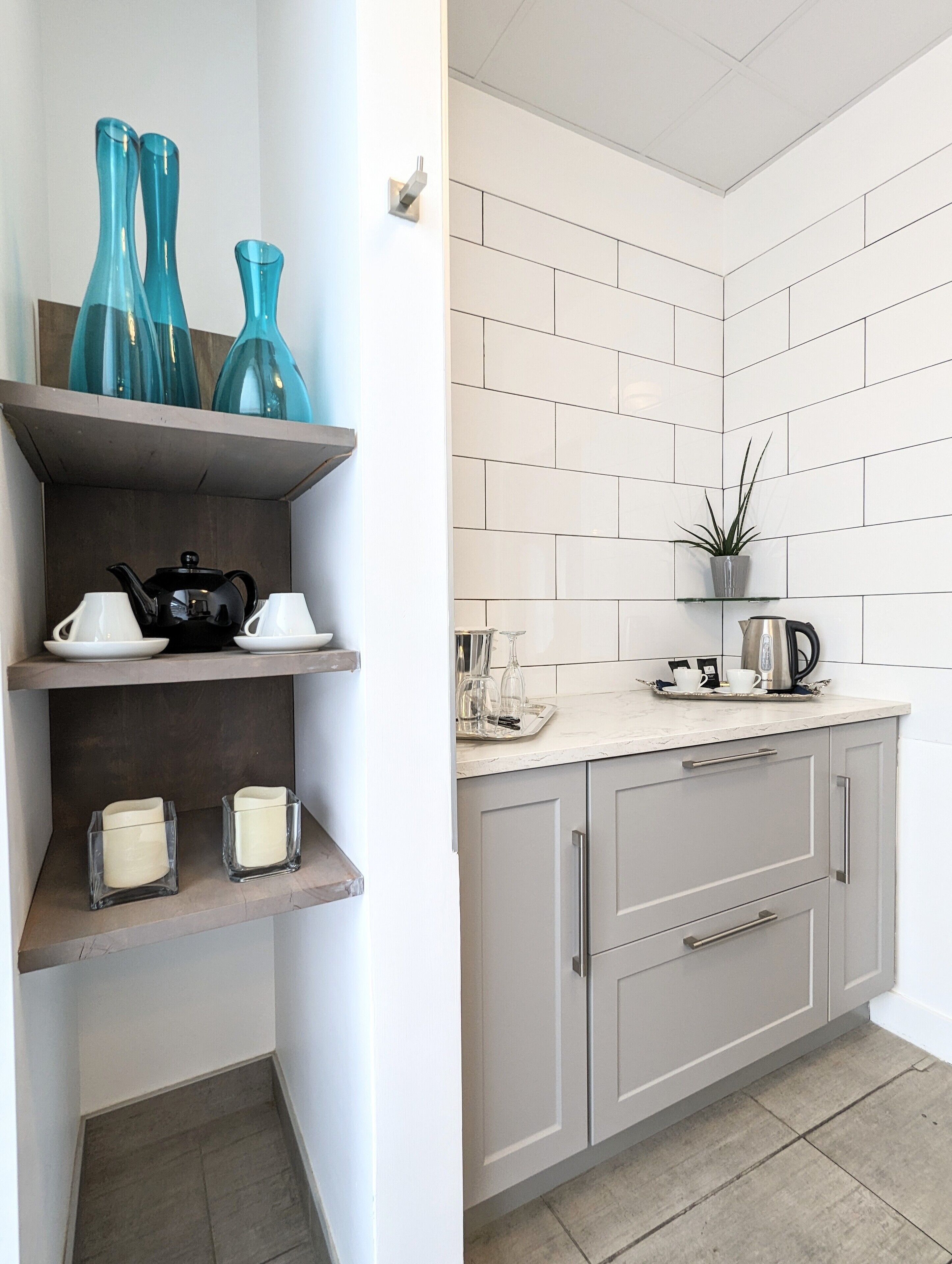 city suite, 1 queen bed with sofa bed, kitchenette, corner | private kitchen | fridge, espresso maker