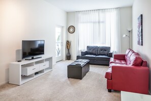 Premium Apartment, 2 Bedrooms, Accessible, City View | 2 bedrooms, premium bedding, desk, iron/ironing board