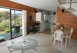 Luxury Cottage, 2 Bedrooms, Garden Area | Living area | Flat-screen TV, DVD player