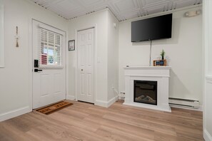 Barefoot Haven | Living area | Flat-screen TV - The Beachside Co. (Sylvan Beach)