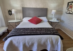 Hummingbird Room | Premium bedding, desk, laptop workspace, iron/ironing board