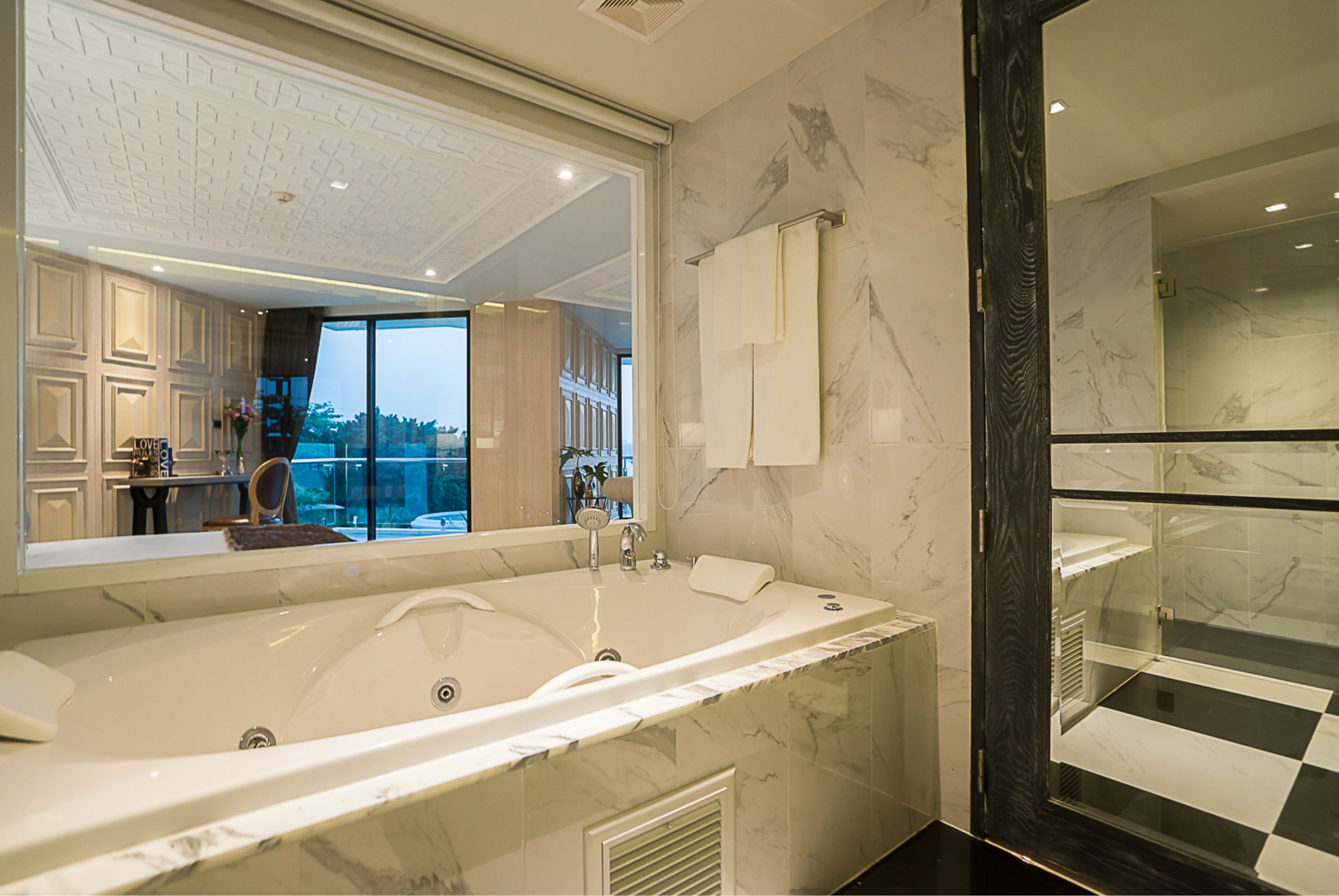 junior suite, 1 king bed, terrace, ocean view | bathroom | separate bathtub and shower, deep-soaking bathtub, rainfall showerhead