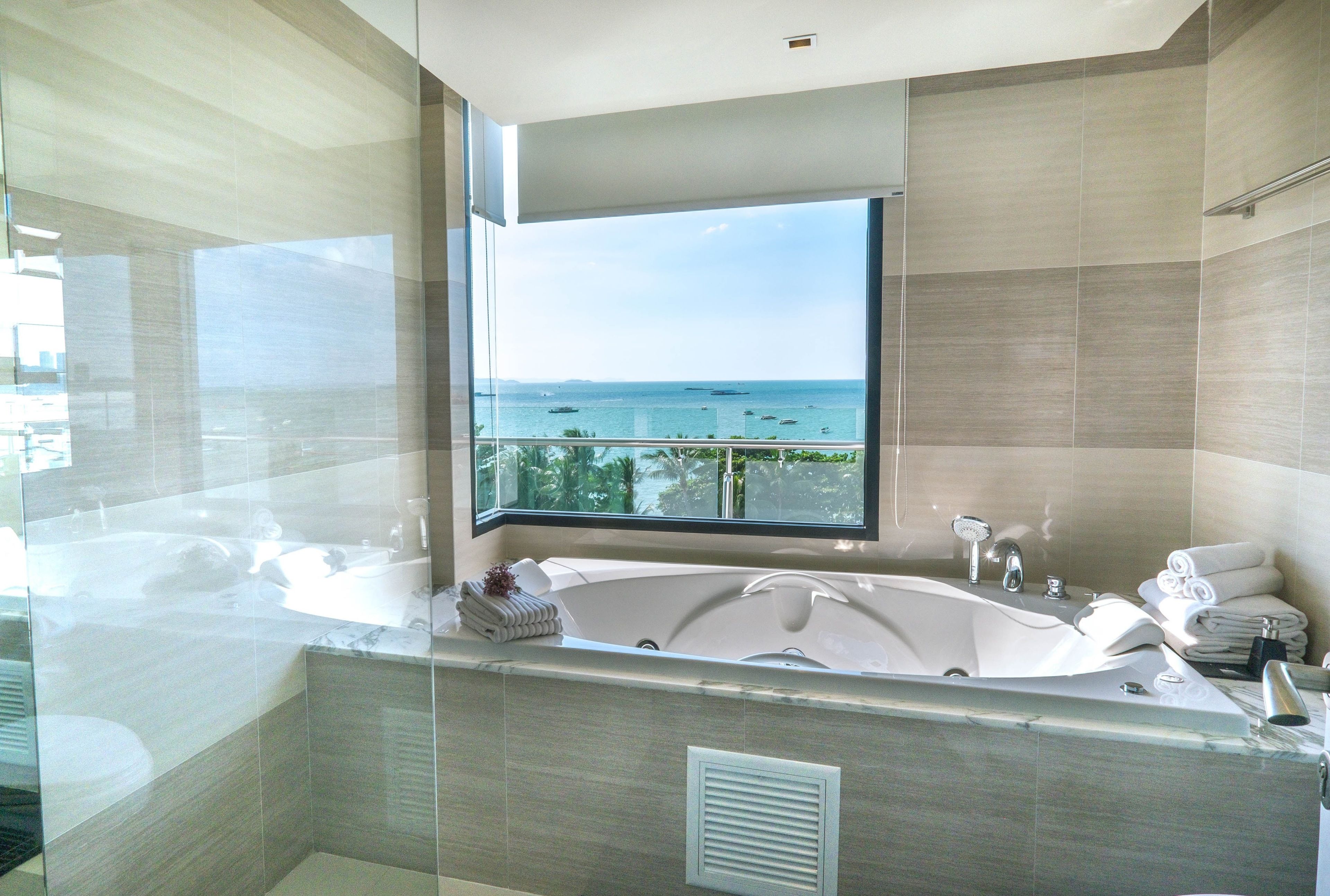 signature suite, 2 bedrooms, terrace, ocean view | bathroom | separate bathtub and shower, deep-soaking bathtub, rainfall showerhead