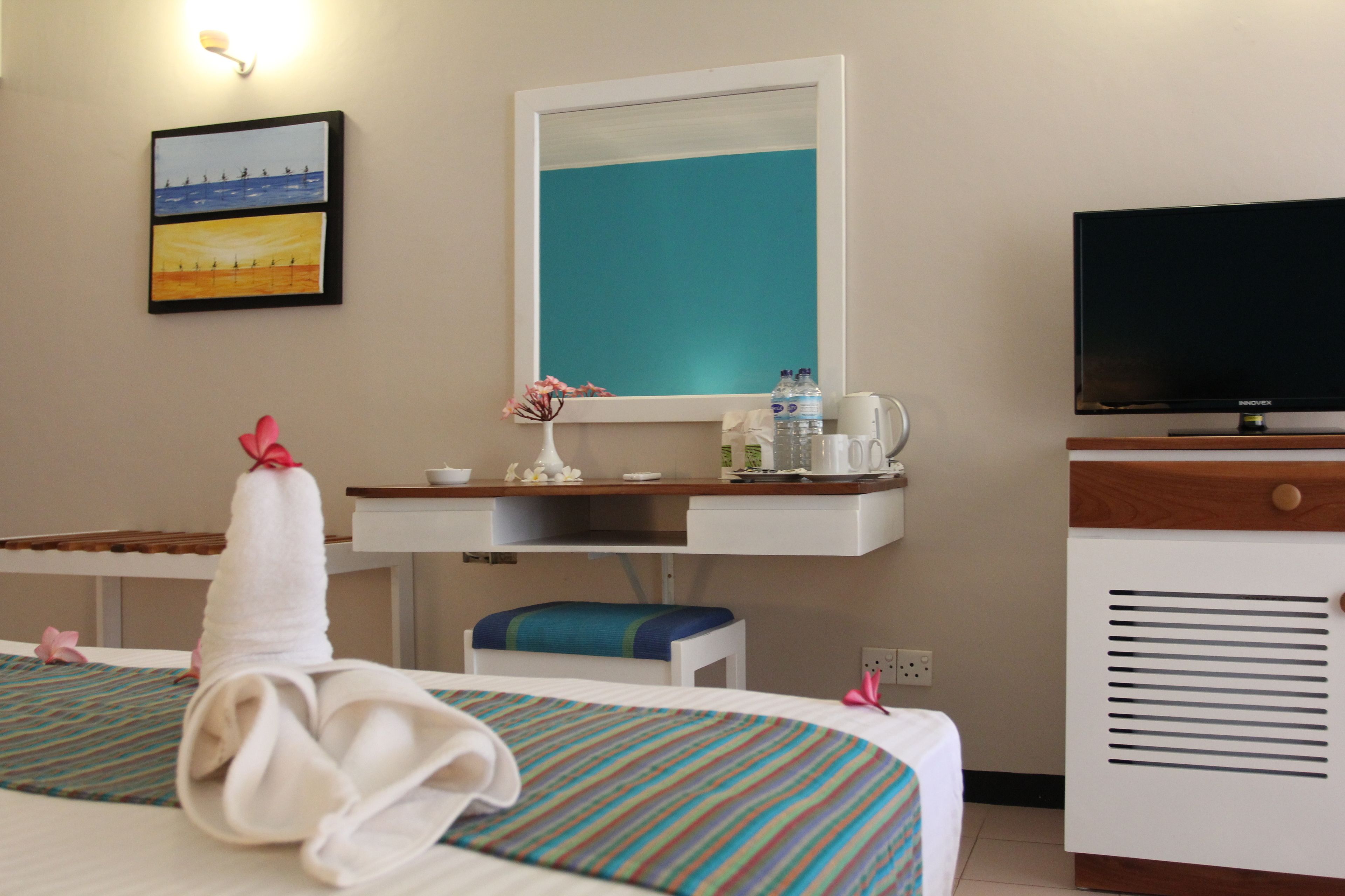 deluxe room | in-room safe, desk, iron/ironing board, free cots/infant beds