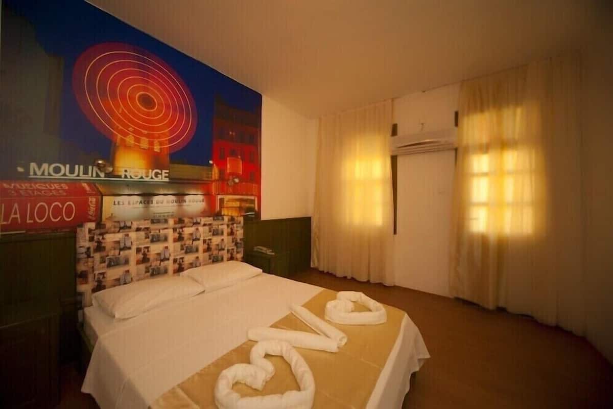 Standard Triple Room | Free minibar items, in-room safe, desk, blackout drapes