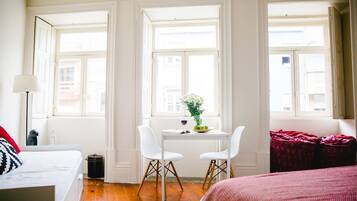 Superior Studio, City View | Living area | Flat-screen TV