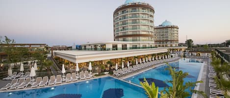 Indoor pool, pool umbrellas, pool loungers