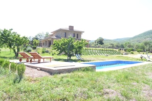 Outdoor pool, pool umbrellas, pool loungers