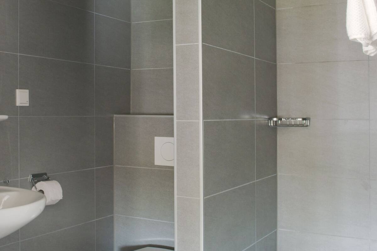 deluxe double room | bathroom | free toiletries, hair dryer, towels