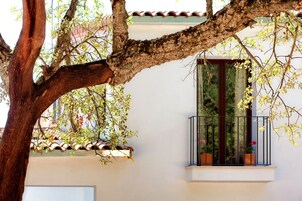 Habitación superior, 1 cama de matrimonio grande | Balcón