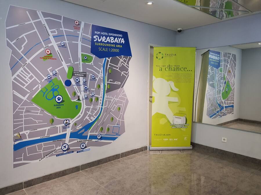 A map of Surabaya with a hospital, zoo, and a hotel.
